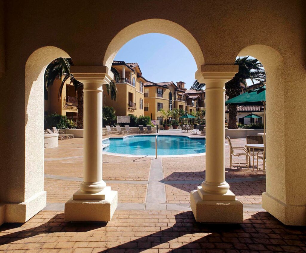 ROMAN ARCHES and SWIMMING POOL in the PALM VALLEY APARTMENT COMPLEX in SAN JOSE CALIFORNIA.- Architecture photography by Eagle Visions Photography