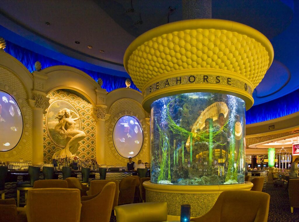 The SEAHORSE BAR and its aquarium inside of CEASARS PALACE HOTEL in LAS VEGAS, NEVADA. 	- Architecture photography by Eagle Visions Photography