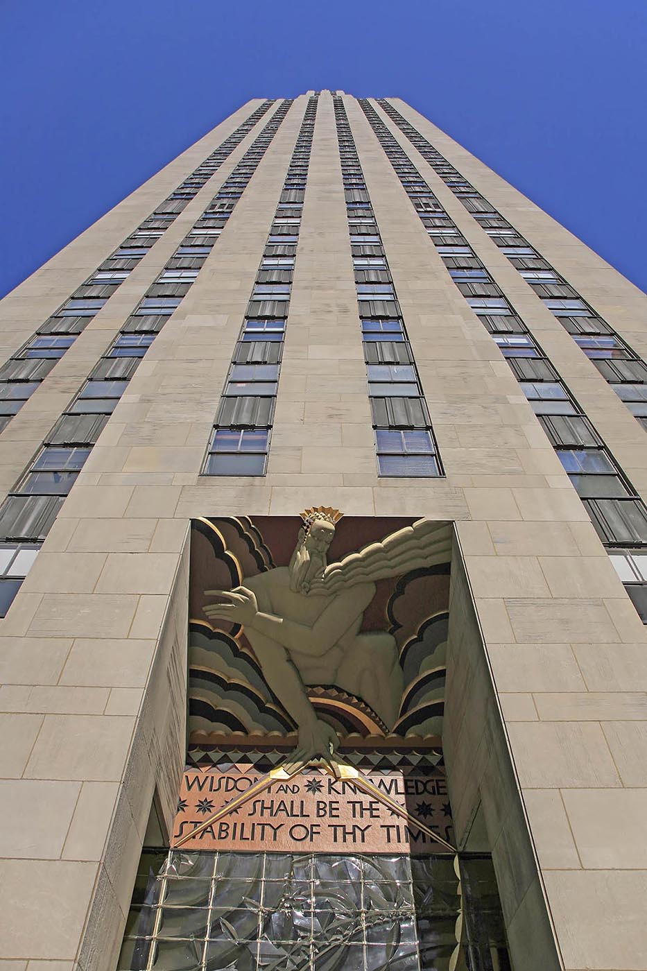 LEE LAWRIE'S “WISDOM, LIGHT and SOUND” sculpture atop the entrance to 30 ROCKEFELLER CENTER in NEW YORK CITY.  - Architecture photography by Eagle Visions Photography