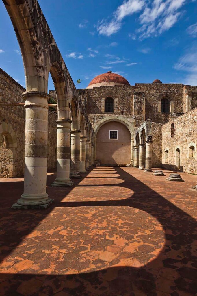 Stone ARCHWAYS in the 16th century CONVENT of CUILAPAN the former Monastery of Santiago Apostol in CUILAPAN DE GUERRERO MEXICO near OAXACA.   - Architecture photography by Eagle Visions Photography