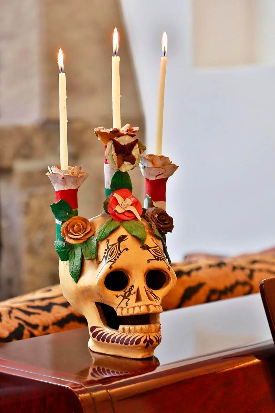 A SKULL CANDELABRA decorates a home in SAN MIGUEL DE ALLENDE, MEXICO.  - Architecture photography by Eagle Visions Photography