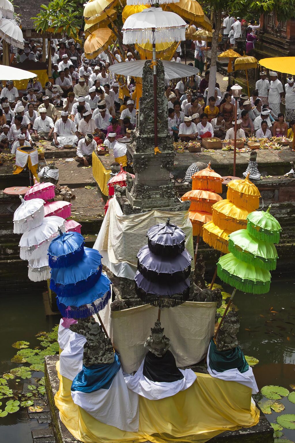 BALINESE faithful bring offerings to the PURA BEJI in the village of Mas during the GALUNGAN FESTIVAL - UBUD, BALI, INDONESIA
