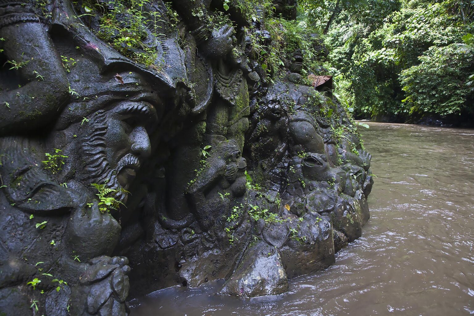 Artisans have carved the story of the RAMAYANA in stone along the banks of the AYUNG RIVER - UBUD, BALI, INDONESIA