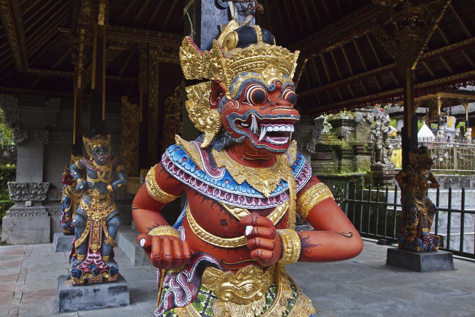Wood carved deity strut at PURA GUNUNG KAWI, a Hindu water temple dedicated to the god of wisdom VISHNU - SEBATU, BALI, INDONESIA