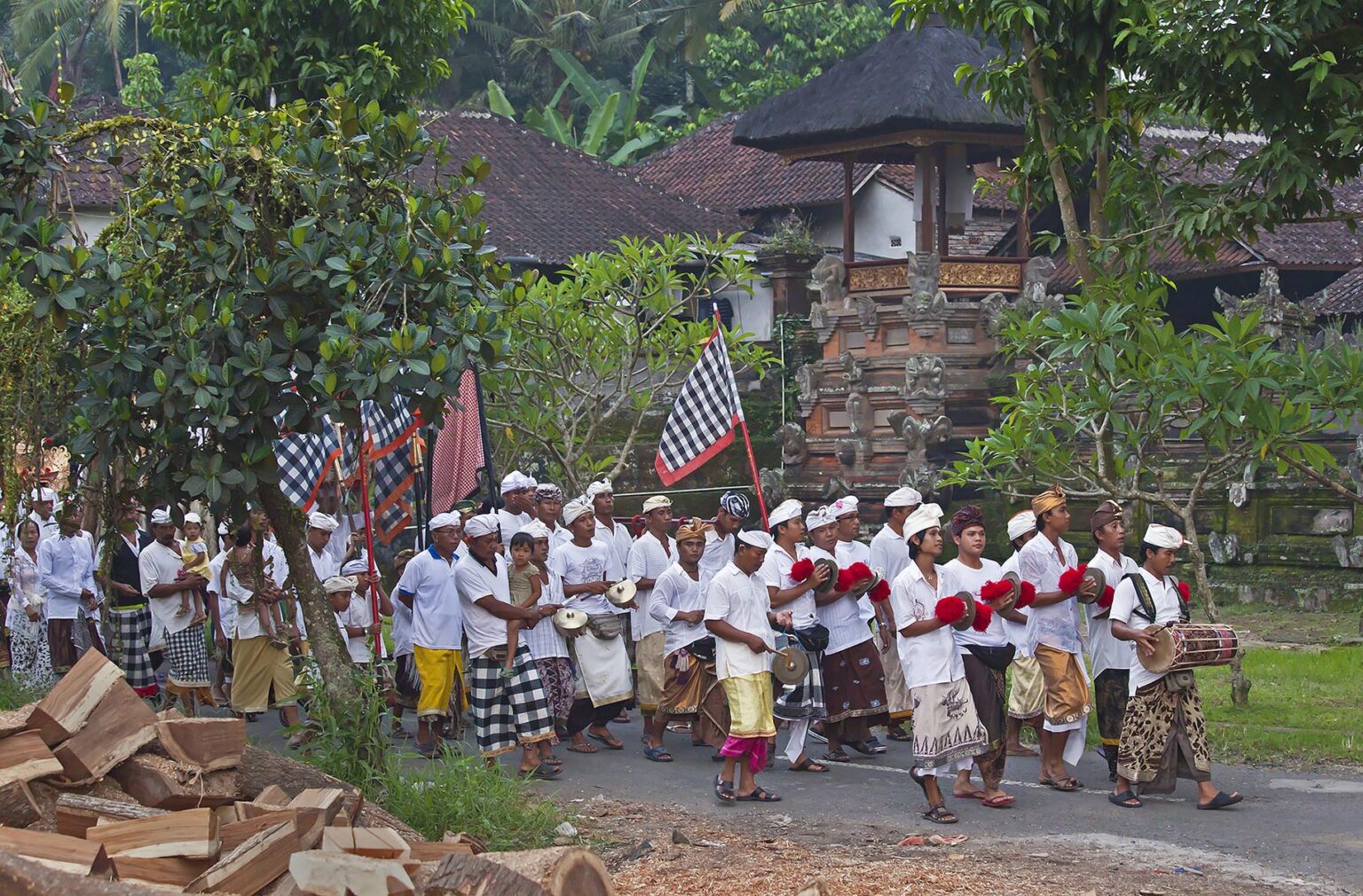 DRUMS and CYMBALS are played during a HINDU PROCESSION for a temple anniversary - UBUD, BALI