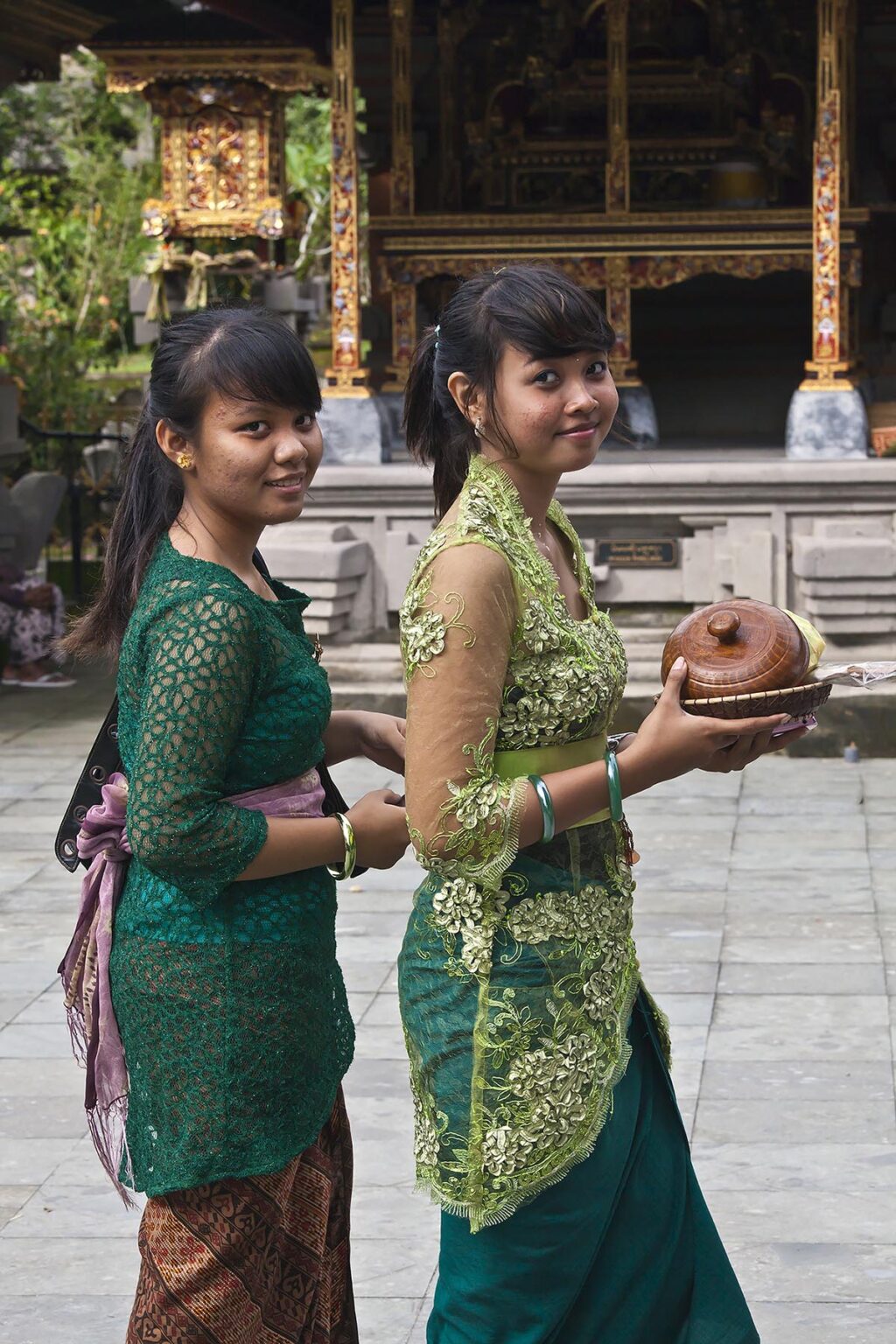 Women bring offering to the PURA TIRTA EMPUL TEMPLE COMPLEX during the GALUNGAN FESTIVAL -  TAMPAKSIRING, BALI, INDONESIA