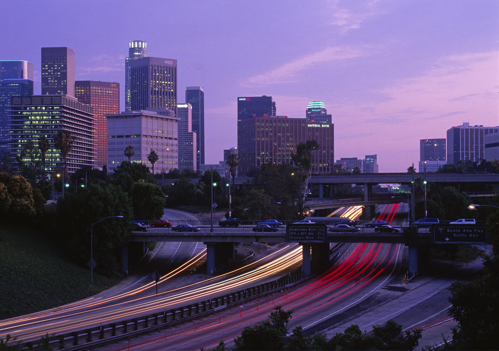 The downtown LOS ANGELES SKYLINE & FREEWAY at sunset - CALIFORNIA