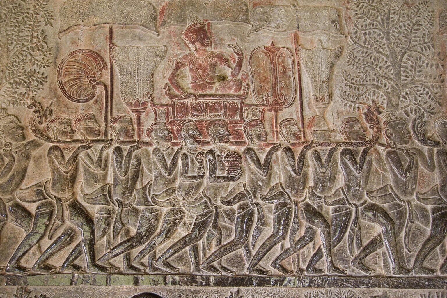 Stone carved bas relief (Northern pavilion of Western Gallery) of a royal procession from the Ramayana at Angkor Wat - Cambodia