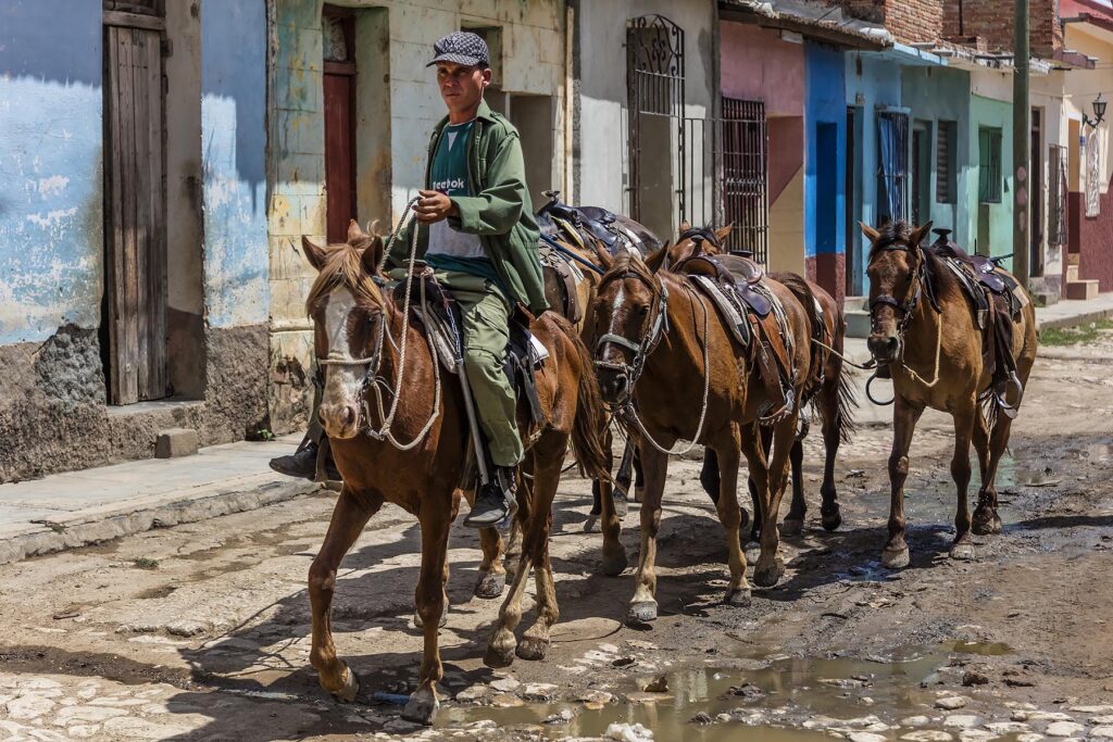 Horses and cowboys are a common site on the cobblestone streets of TRINIDAD, CUBA