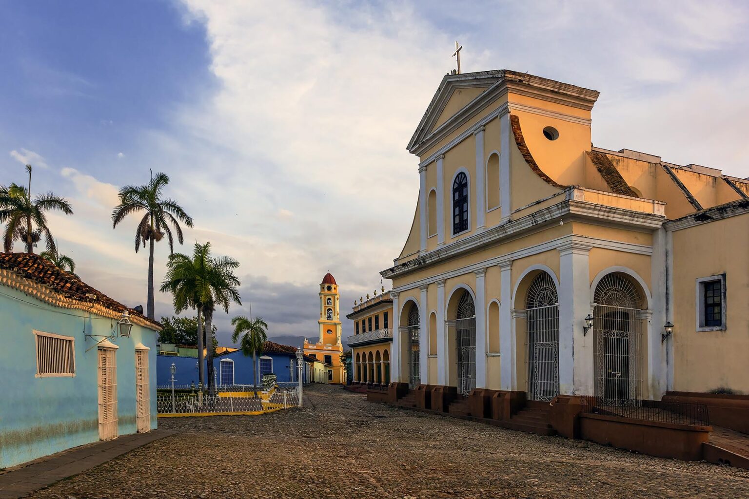 The IGLESIA PARROQUIAL DE LA SANTISIMA TRINIDAD is located on PLAZA MAYOR - TRINIDAD, CUBA