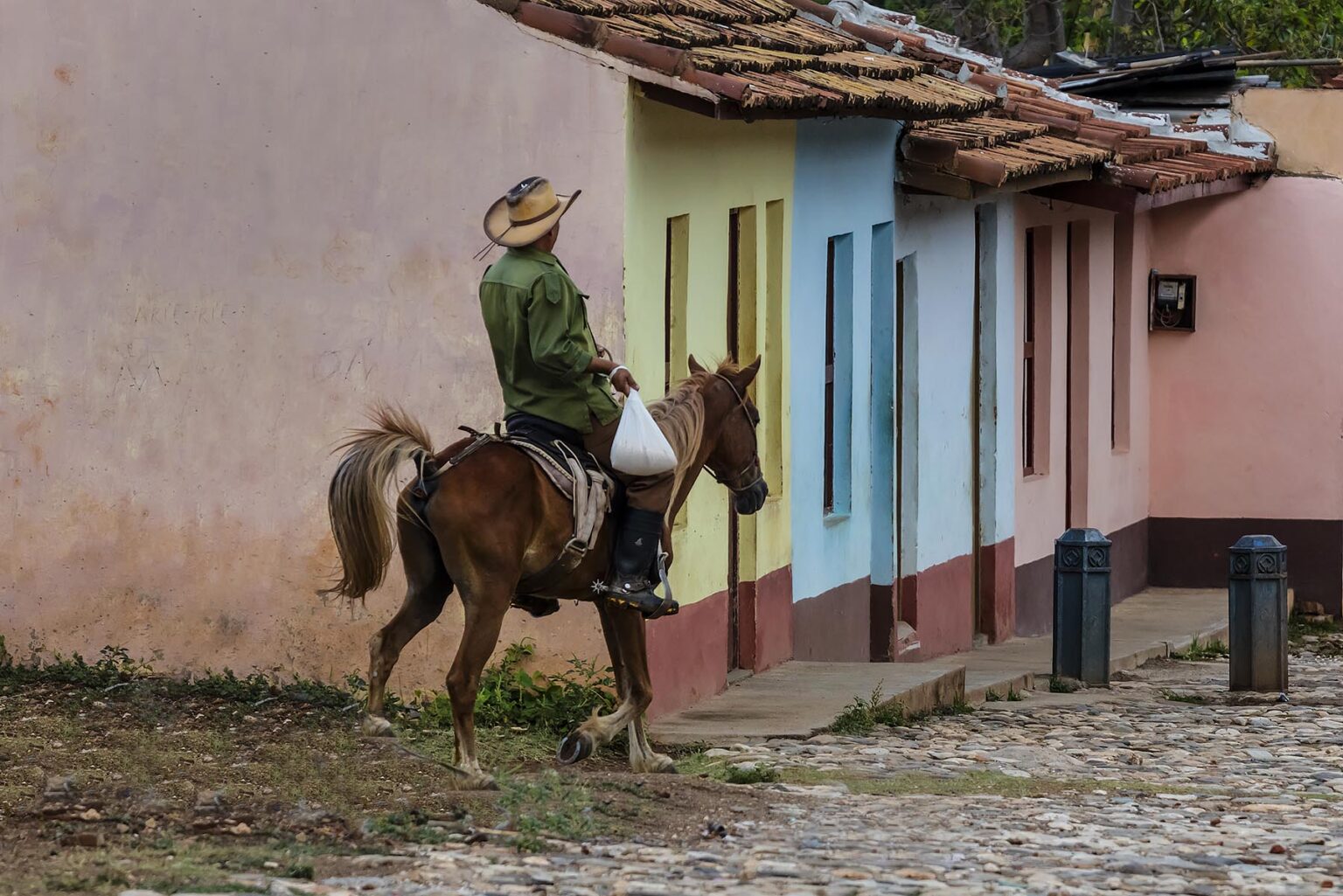Horses and cowboys are a common site on the cobblestone streets of TRINIDAD, CUBA