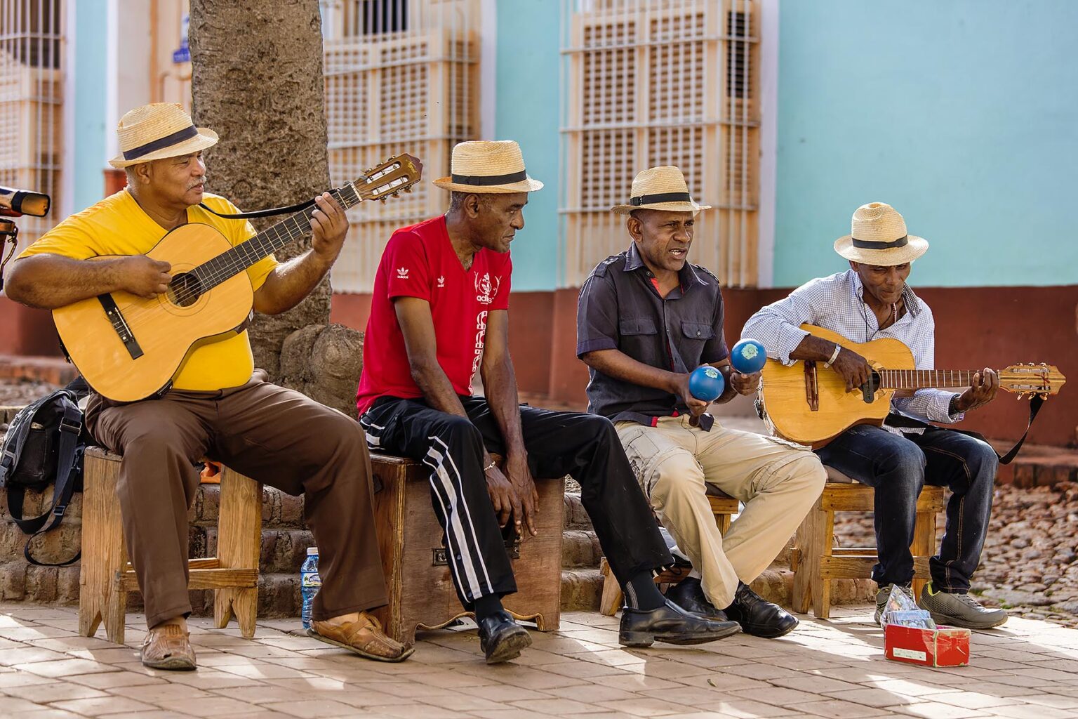 A CUBAN band plays traditional music in a courtyard - TRINIDAD, CUBA