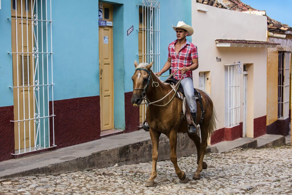 Horses and cowboys are a common site on the cobblestone streets of TRINIDAD, CUBA