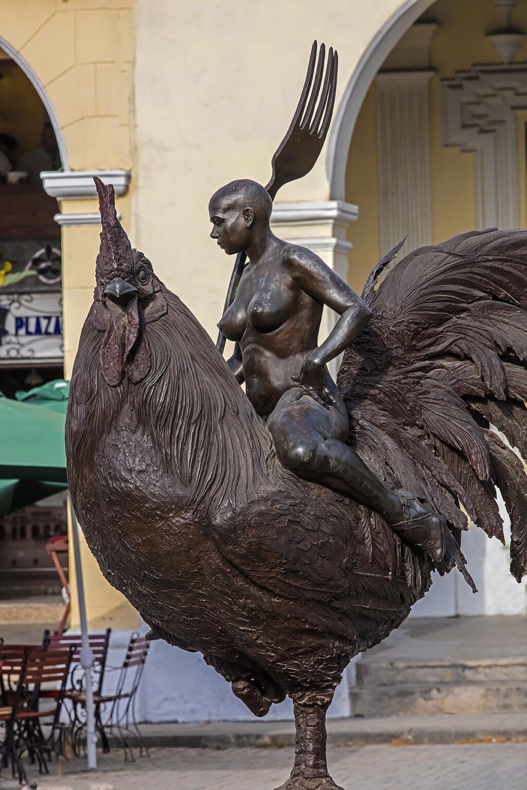 Sculpture of a nude woman riding a rooster in the PLAZA VIEJA of Old Habana - HAVANA, CUBA
