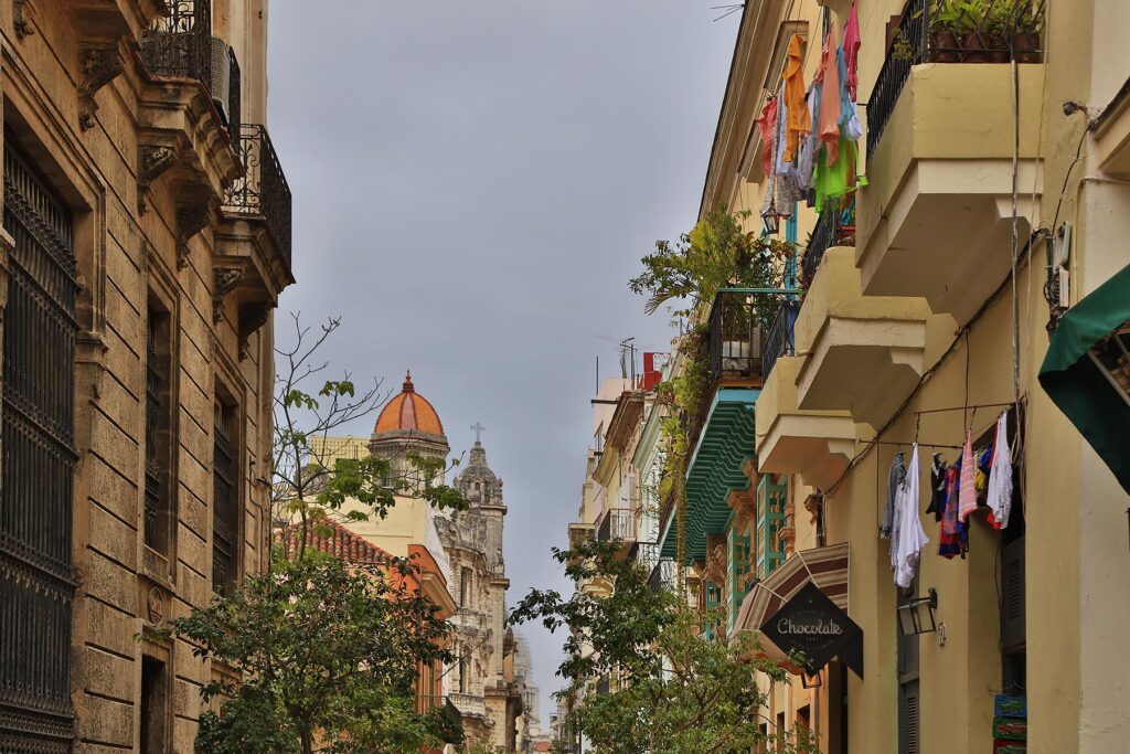 Historical architecture along Mercaderes Street in HABANA VIEJA at dusk - HAVANA, CUBA