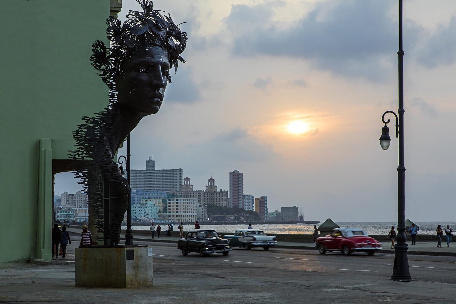 Large public art sculpture of a woman along the MALECON - HAVANA, CUBA
