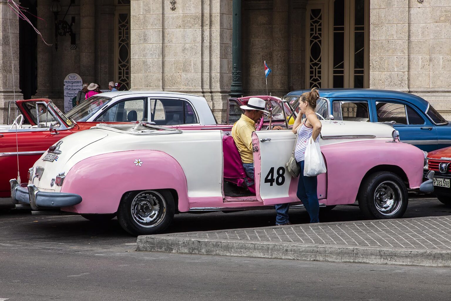 Classic American car taxi in front of the HOTEL INGLATERRA LA TARAZZA  along the PASEO DE MARTI  - HAVANA, CUBA