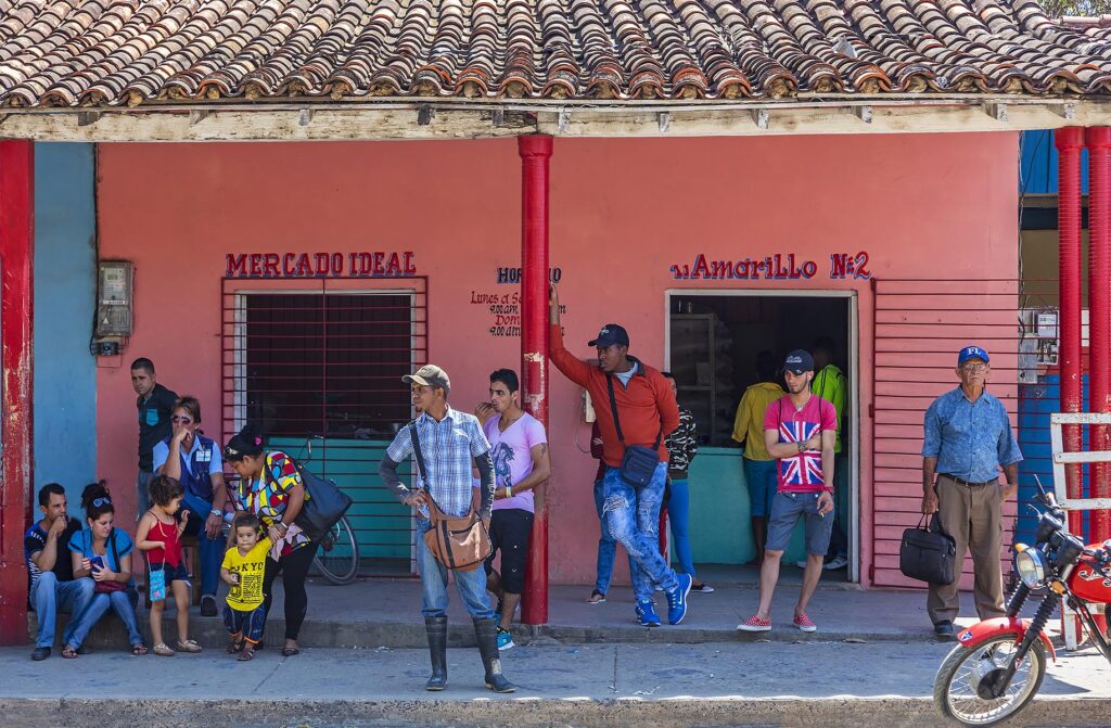 Cubans wait for a bus at the mercado  - VINALES, PINAR DEL RIO, CUBA