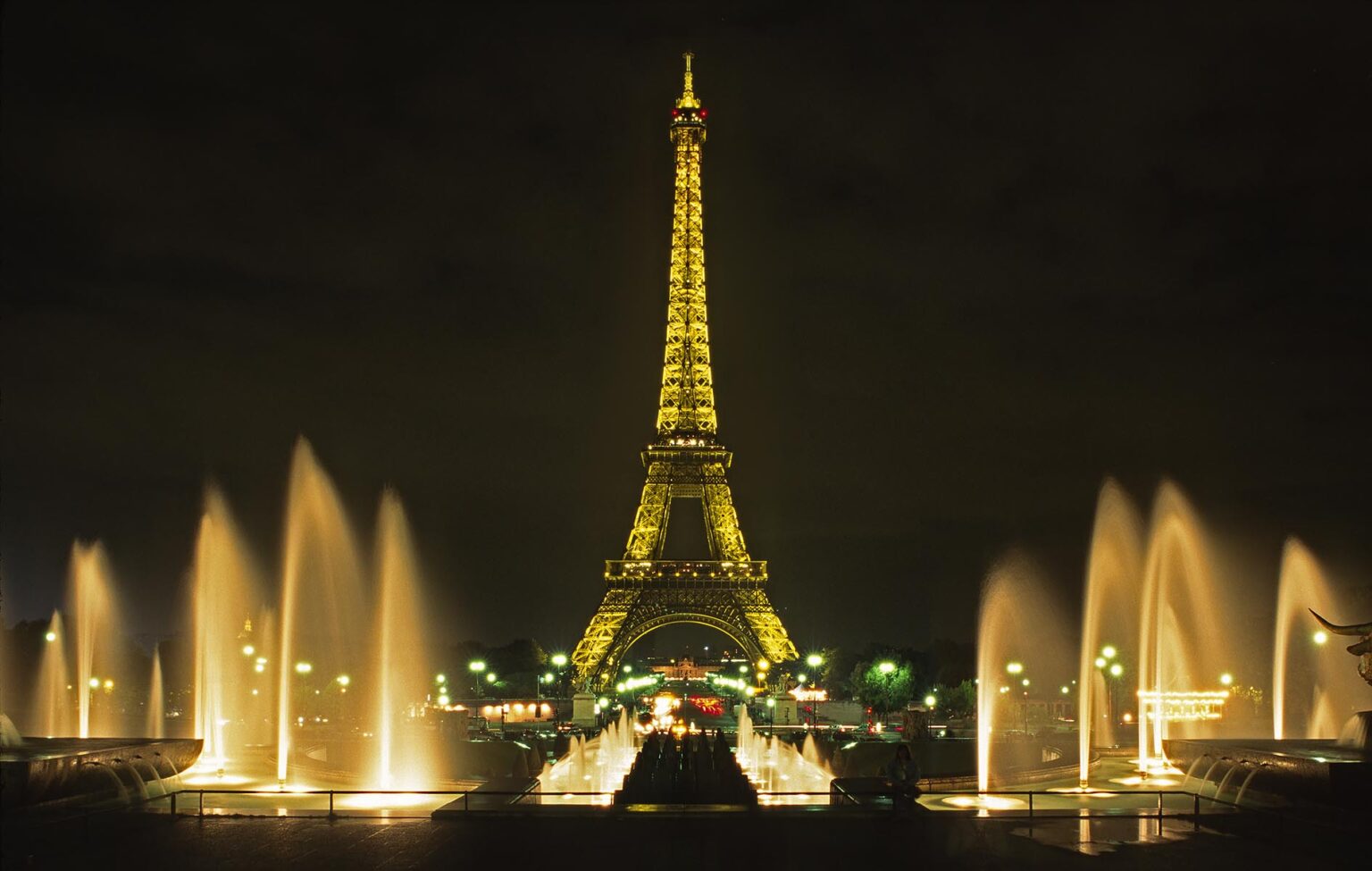Night shot of The EIFFEL TOWER & the fountains of The PALACE OF CHAILLON - PARIS, FRANCE