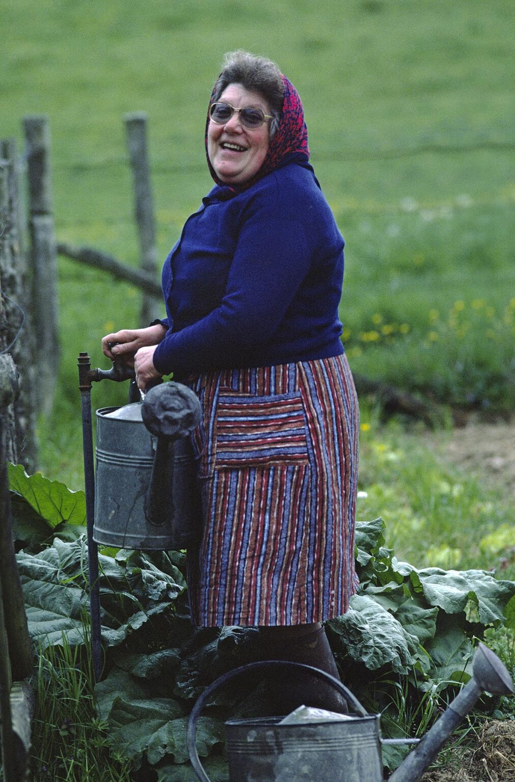 FRENCH COUNTRY WOMAN near ALLEVARD filling WATERING CANS - LOIRE VALLEY, FRANCE