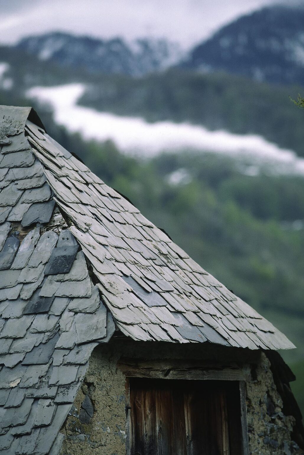 DETAIL of STONE SHINGLED ROOF and FARM HOUSE - PYRENEES MOUNTAINS, FRANCE