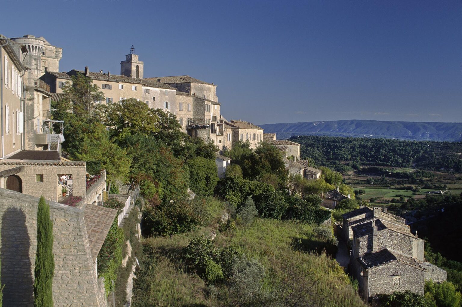 The village of GORDES sits dramatically on top of a hill - PROVENCE, FRANCE