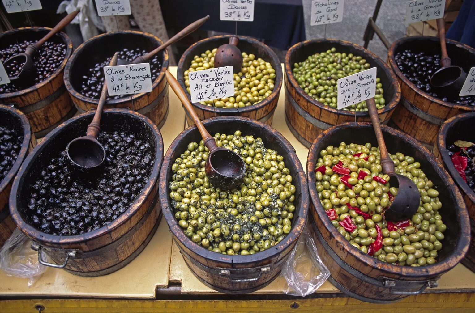 Local OLIVES for sale on Market Day in the golden-stone village of GORDES  - PROVENCE, FRANCE