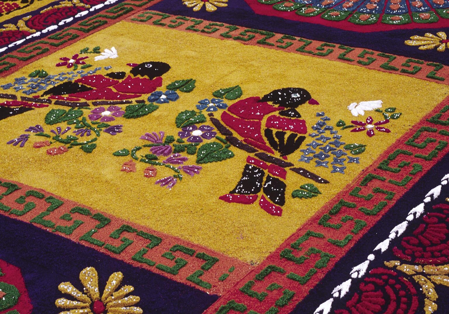 ALFOMBRA (carpet) with CATHOLIC symbolism and MAYAN imagery during GOOD FRIDAY procession - ANTIGUA, GUATEMALA
