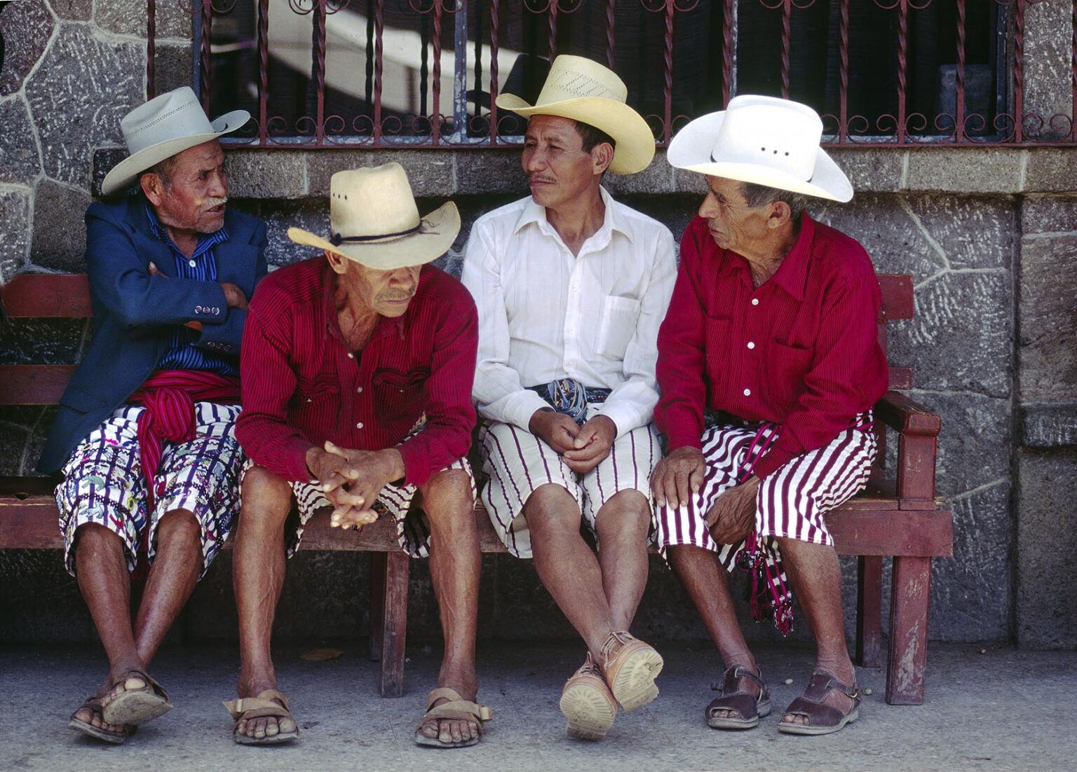 TZUTUJIL MEN in traditional dress with COWBOY HATS - SANTIAGO ATITLAN, GUATEMALA