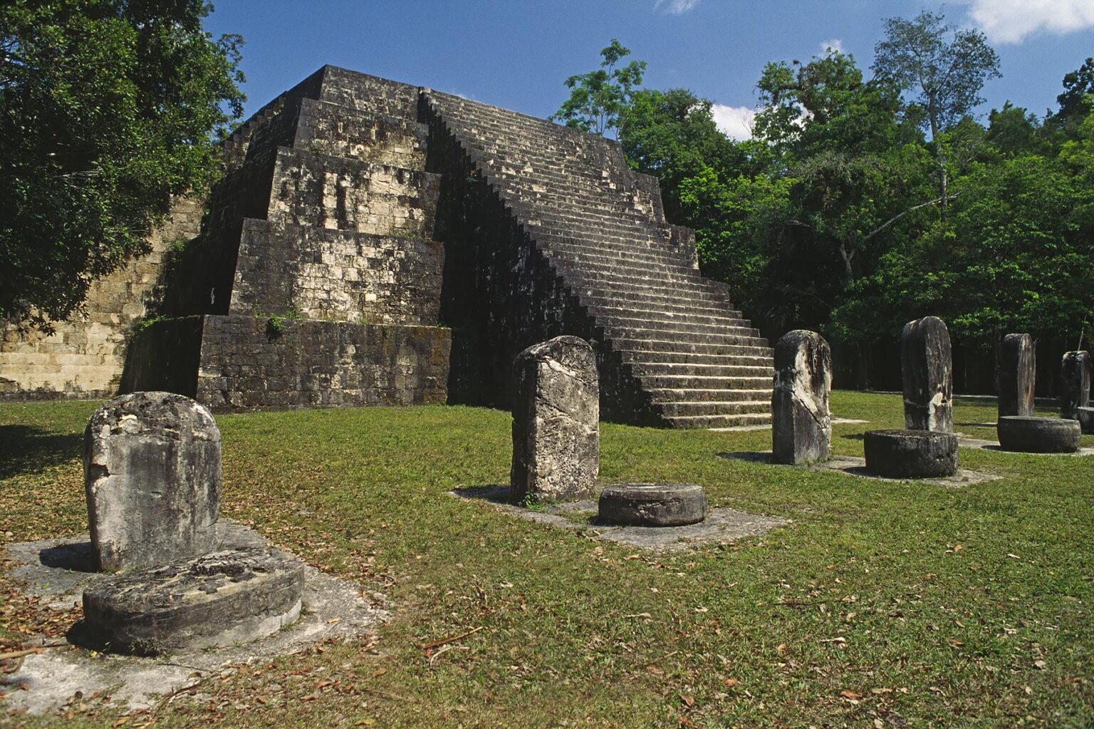 PYRAMID Q COMPLEX, built by CHITAM in 1771 AD, with STELAE and ALTERS  of MAYA RULERS - TIKAL, GUATEMALA