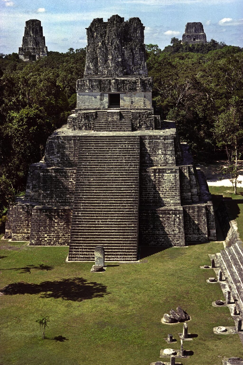 MAYA TEMPLE II, 125 ft. tall and dating to 700 AD, rising out of the PETEN JUNGLE - TIKAL, GUATEMALA