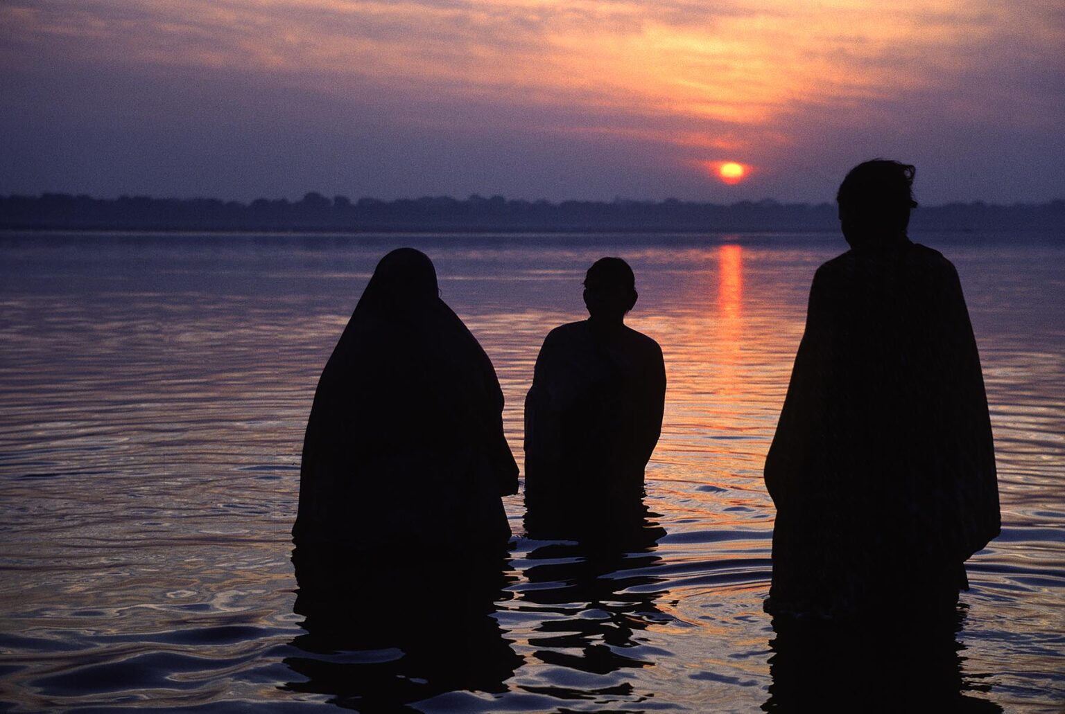 SUNRISE BATHING in the GANGES RIVER - VARANASI (BENARES), INDIA