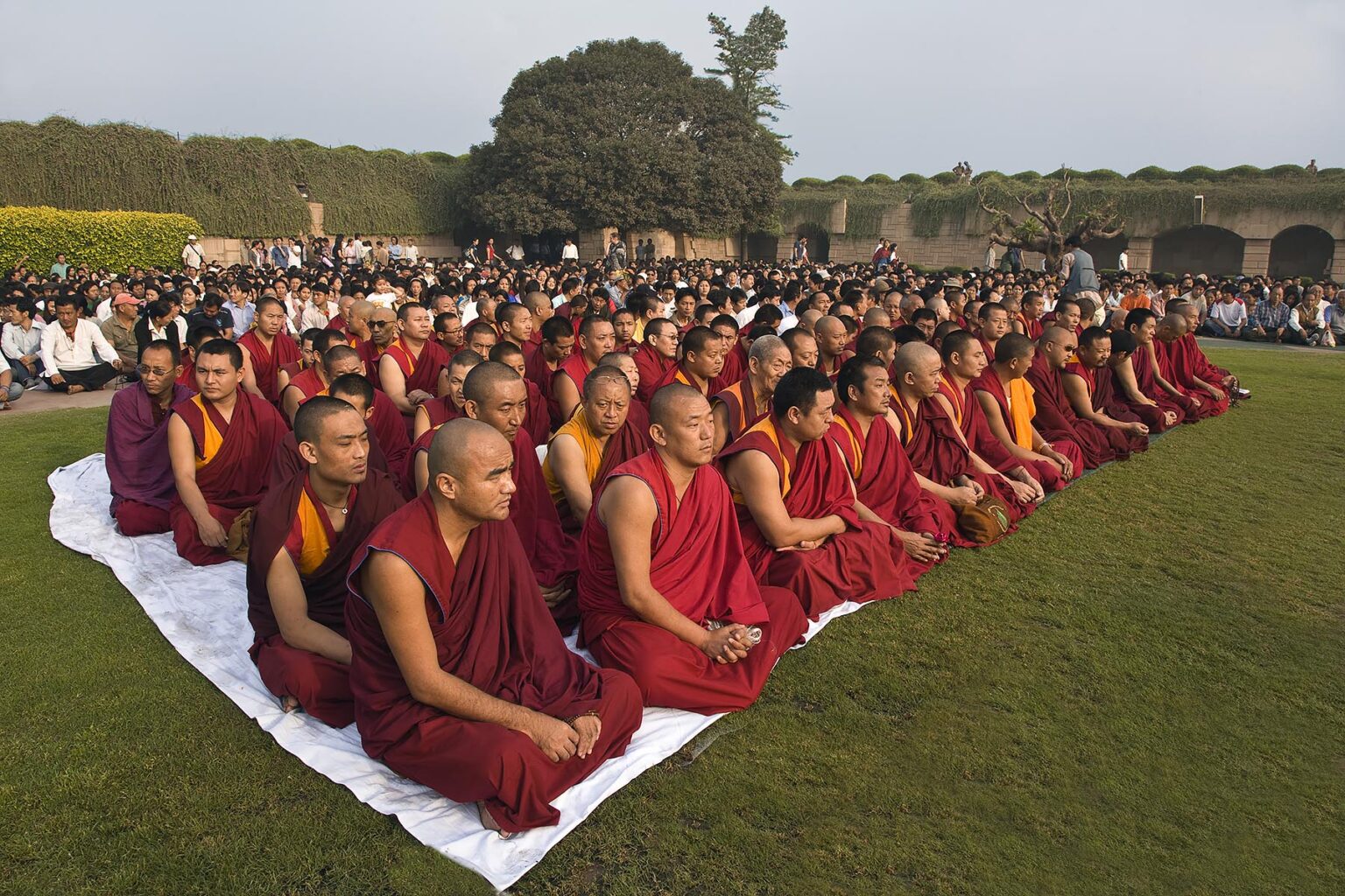 TIBETAN BUDDHIST MONKS attend a PRAYER FOR WORLD PEACE sponsored by the14th Dalai Lama of Tibet at the RAJ GHAT (Ghandi's eternal flame) in April of 2008 -  NEW DELHI, INDIA
