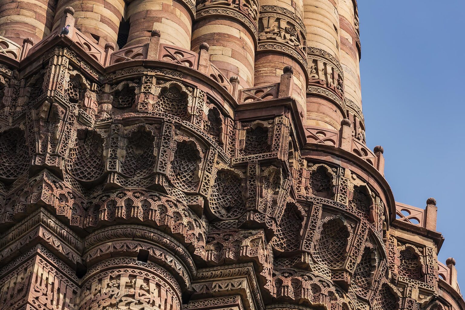 The QUTB MINAR tower is part of a UNESCO site and was constructed in the 12th century - QUTB COPLEX, NEW DELHI, INDIA
