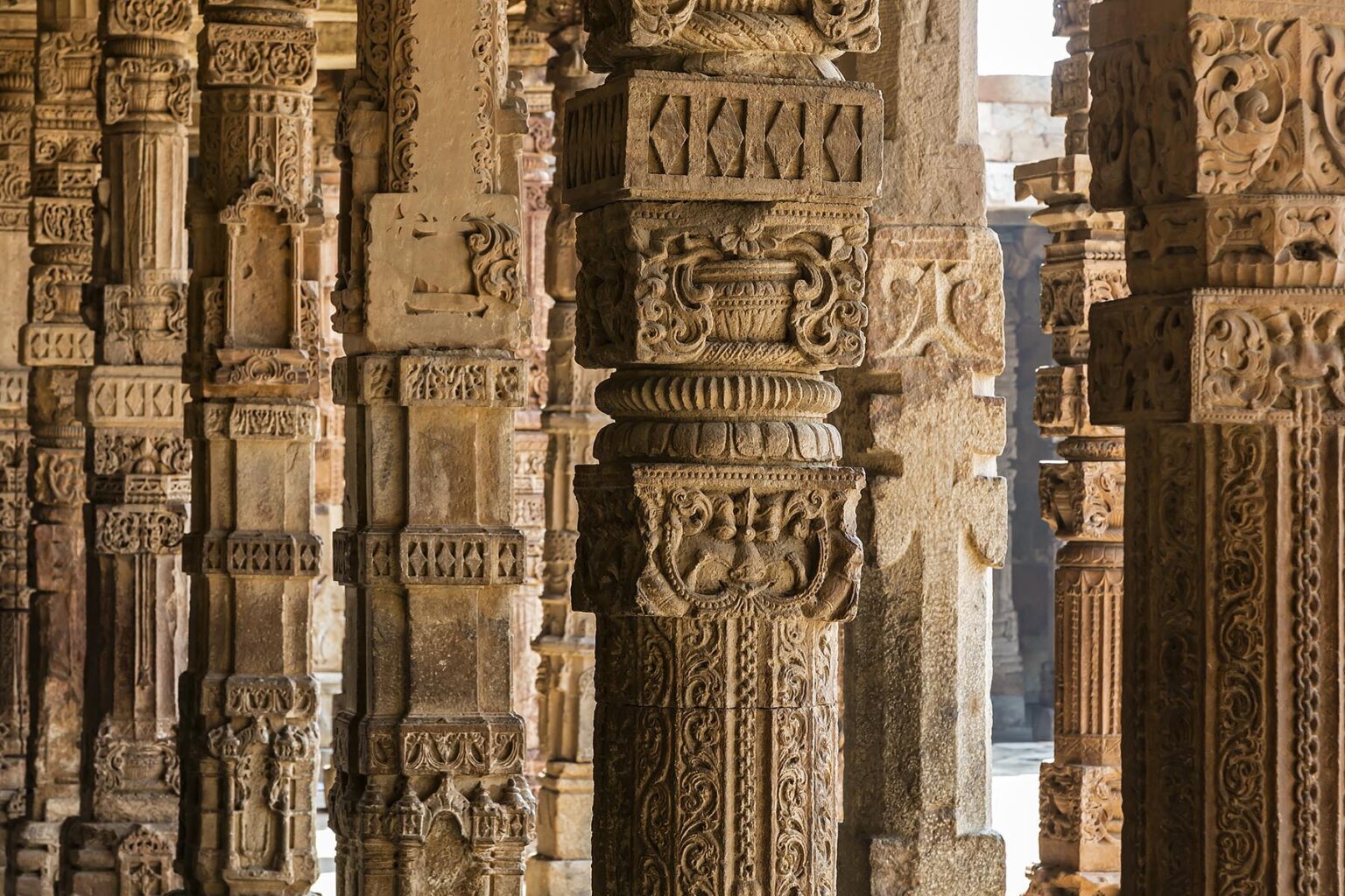 The QUTB COMPLEX, built in the 12th century, is part of a UNESCO WORLD HERITAGE SITE - NEW DELHI, INDIA