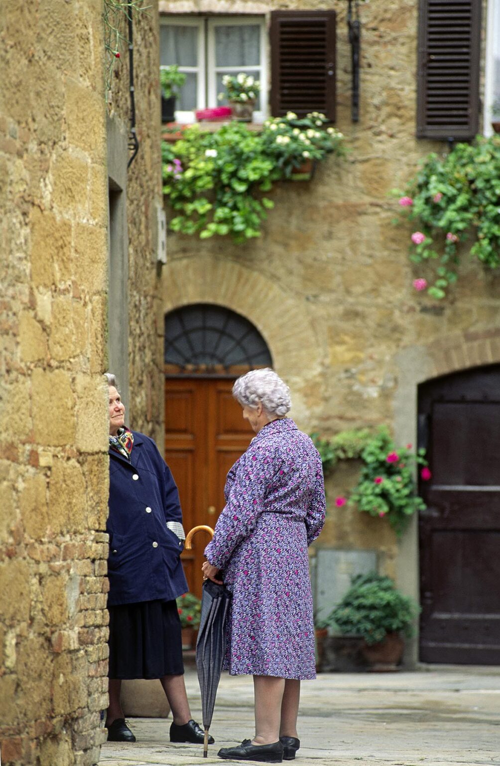 Italian women visit in the RENAISSANCE town of  PIENZA -  TUSCANY, ITALY