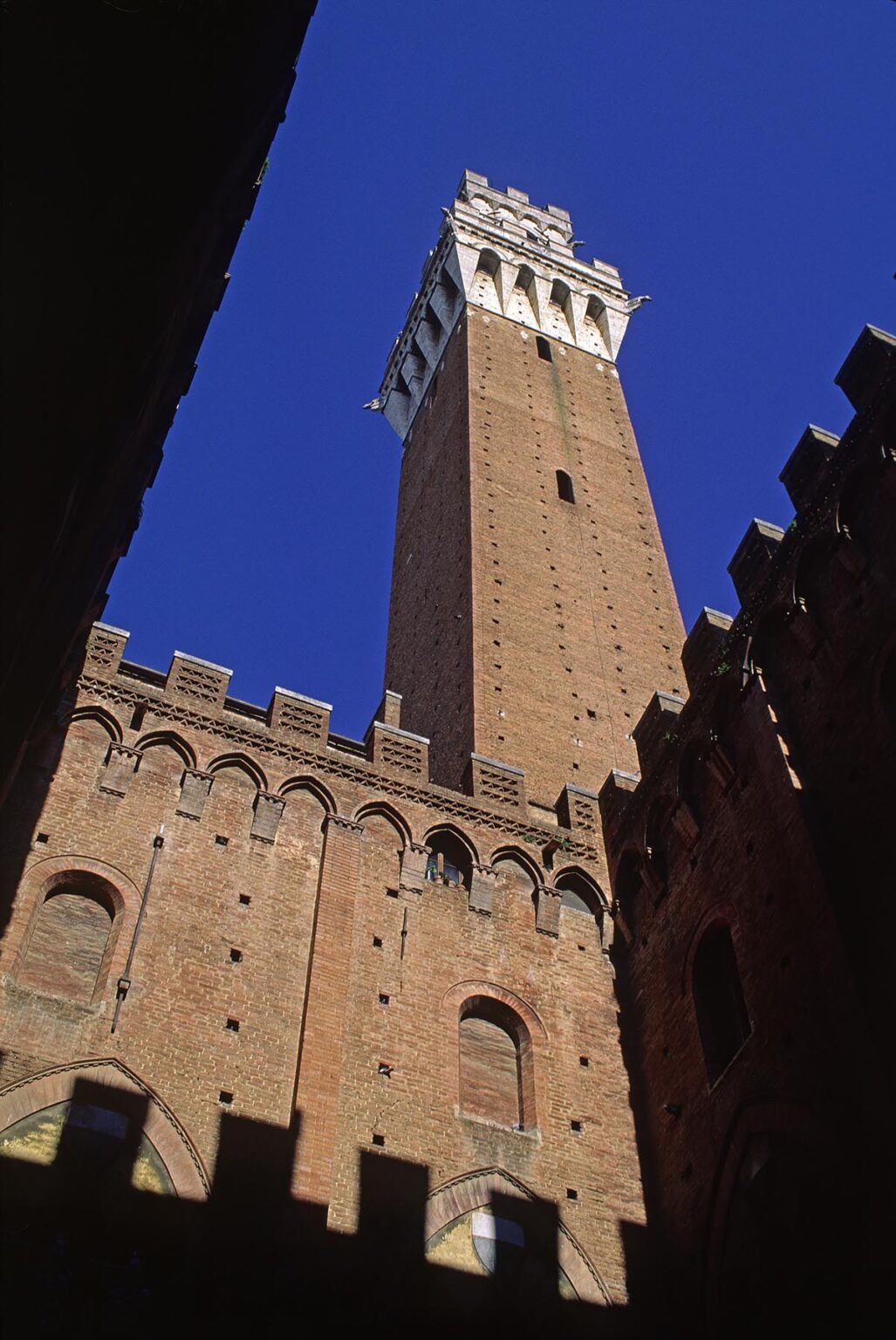 BELL TOWER of the PALAZZO PUBLICO in the CAMPO (central plaza) of the MEDIEVAL city of SIENA - TUSCANY, ITA