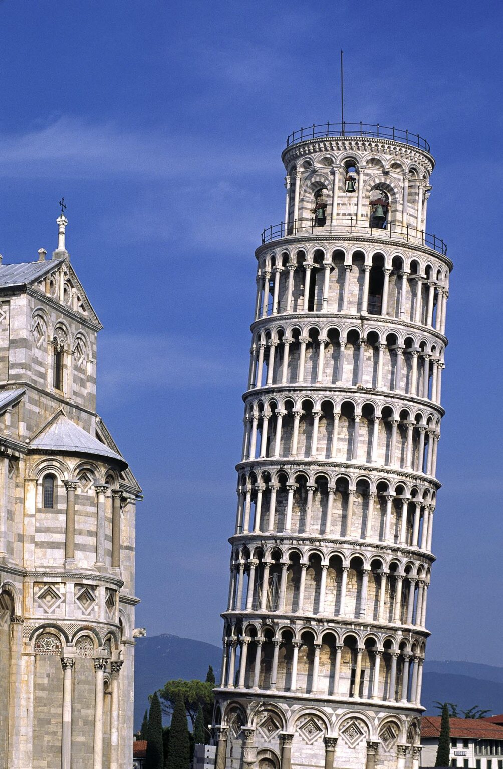 The LEANING TOWER OF PISA was begun in 1174 AD, stands 847 feet, and continues to settle as it did from its inception, ITALY