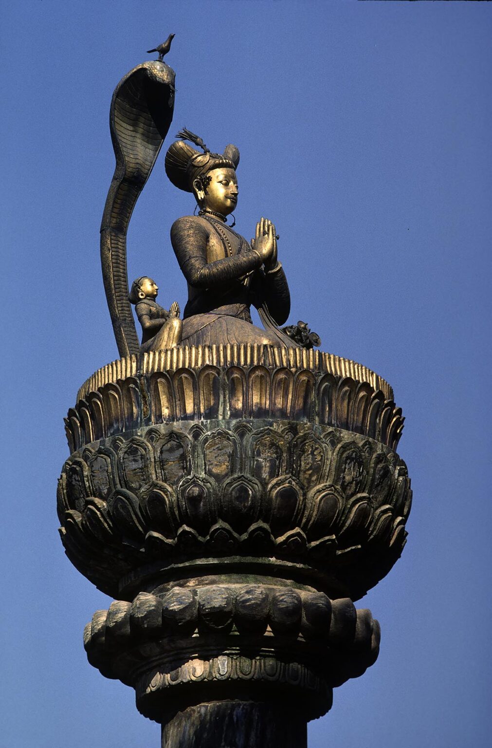 Statue of MALLA KING in PATTAN SQUARE - KATHAMANDU, NEPAL