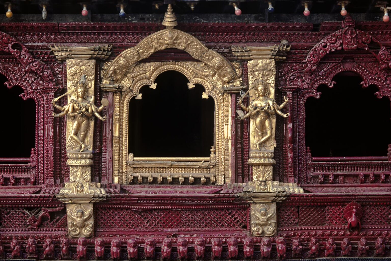The GOLD GILDED WINDOW of the Living Goddess in KATHAMNDU'S DURBAR SQUARE - NEPAL