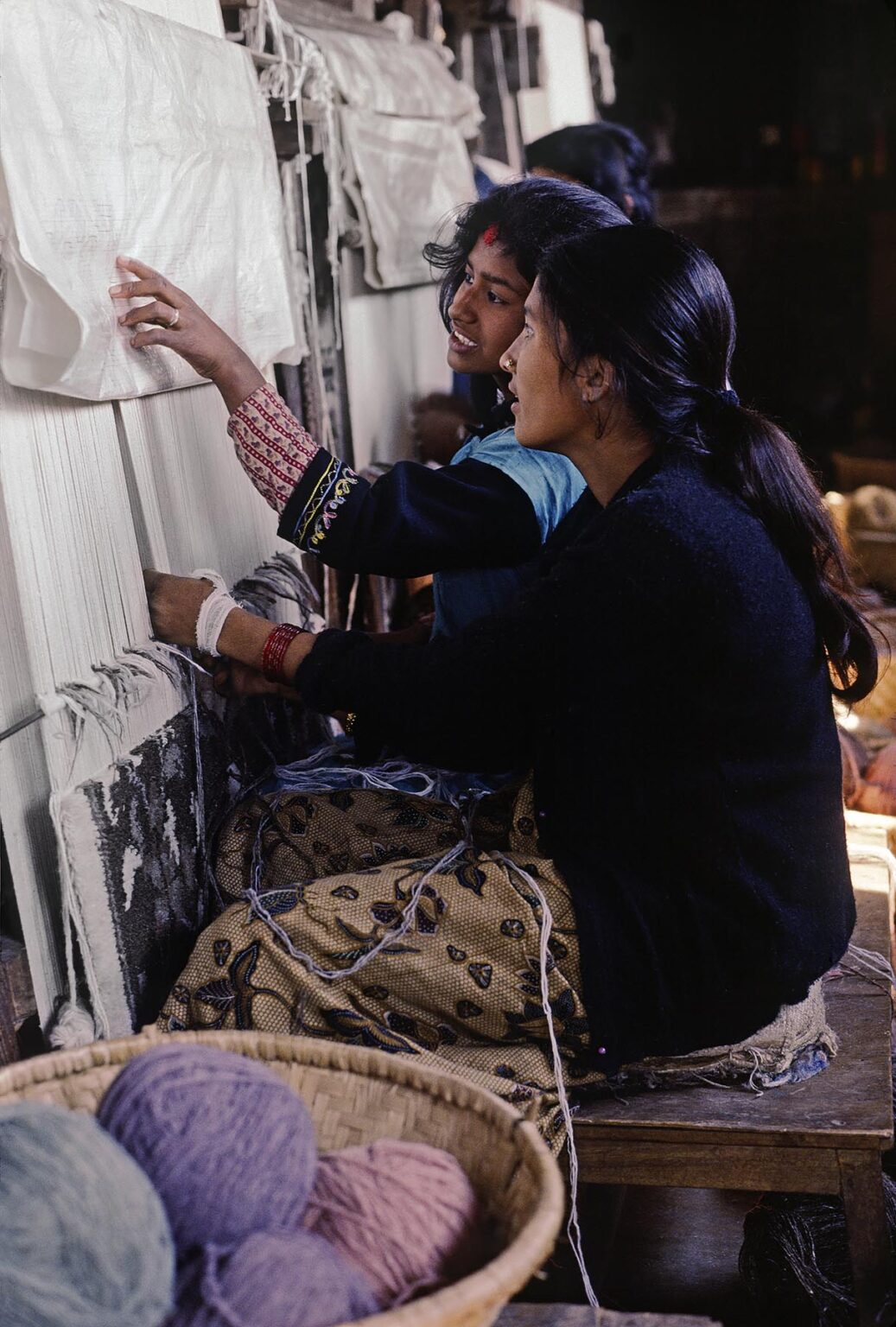 TIBETAN CARPETS are tied by hand at a factory in KATHAMANDU - NEPAL