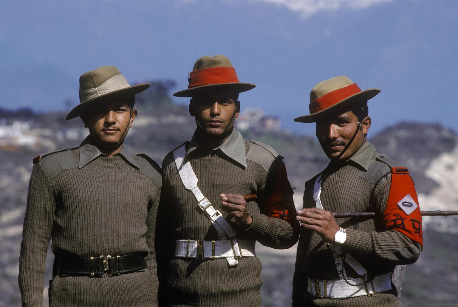 GURKA SOLDIERS with a Himalayan backdrop - KATHAMANDU VALLEY, NEPAL