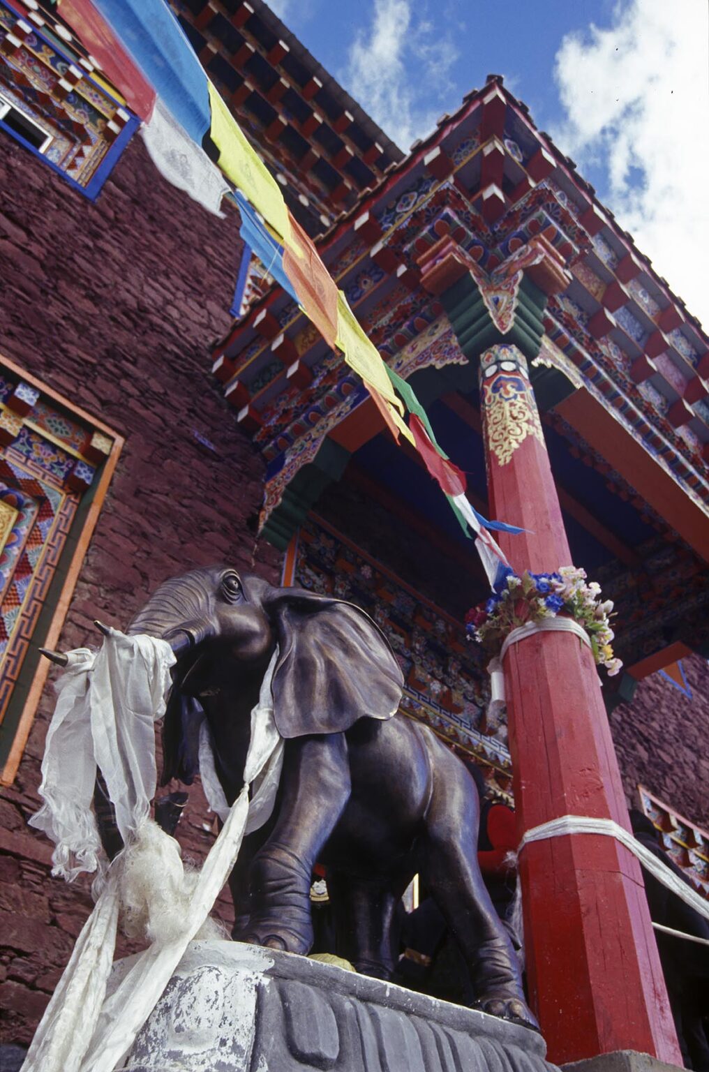 Elephant statue & Tibetan Buddhist temple at Katok Dorjeden Monastery - Kham, (E. Tibet), Sichuan Province, China
