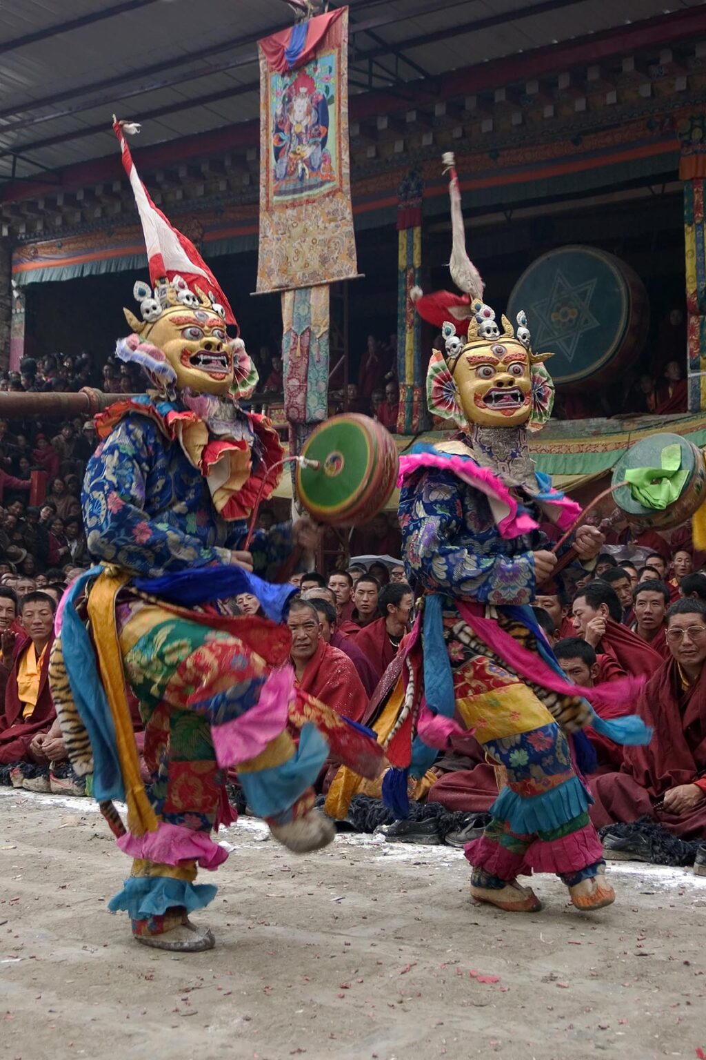Masked dancers with skulls representing impermanence at the Cham dances, Katok Monastery - Kham, (Tibet), Sichuan, China