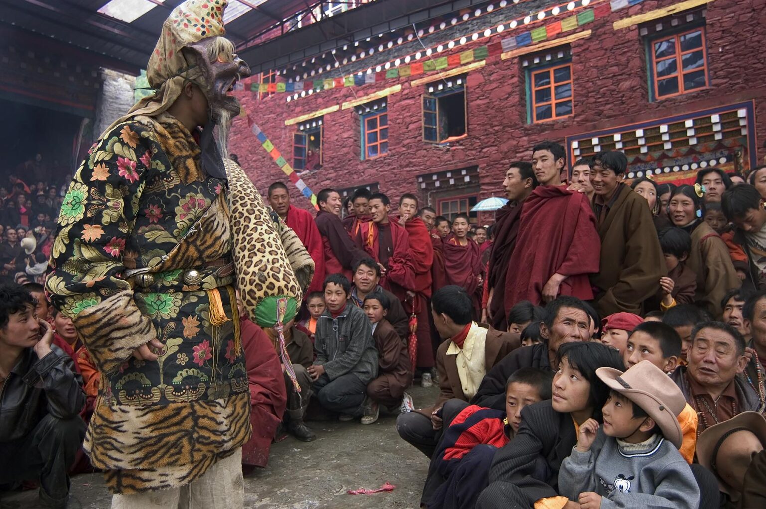 Disciplinarian Clown at the Nyingma Cham Dances, Katok Dorjeden Monastery - Kham, (eastern, Tibet), Sichuan Province, China