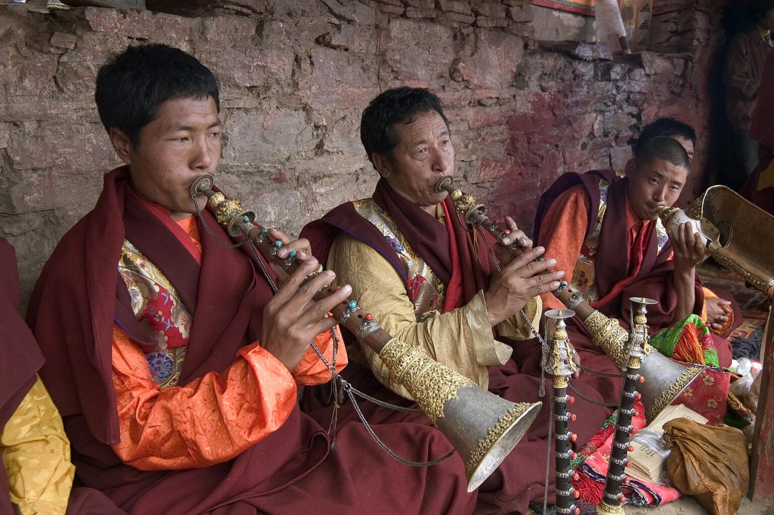 Buddhist monks play kanglings at the Cham dances, Katok Dorjeden Monastery - Kham, (eastern, Tibet), Sichuan Province, China