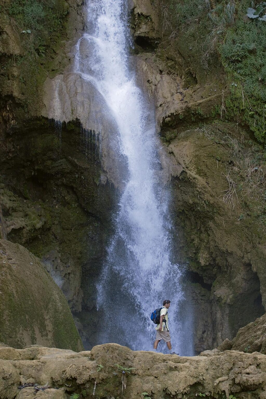 Visitor at the waterfall at Tat Kuang Si, 32 kilometers south of LUANG PROBANG - LAOS