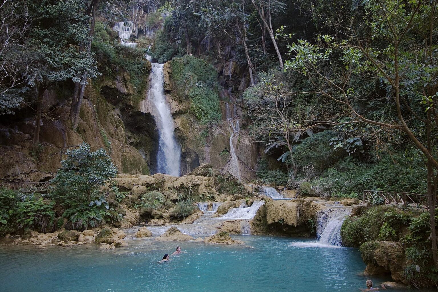 Visitors at the waterfall at Tat Kuang Si, 32 kilometers south of LUANG PROBANG - LAOS