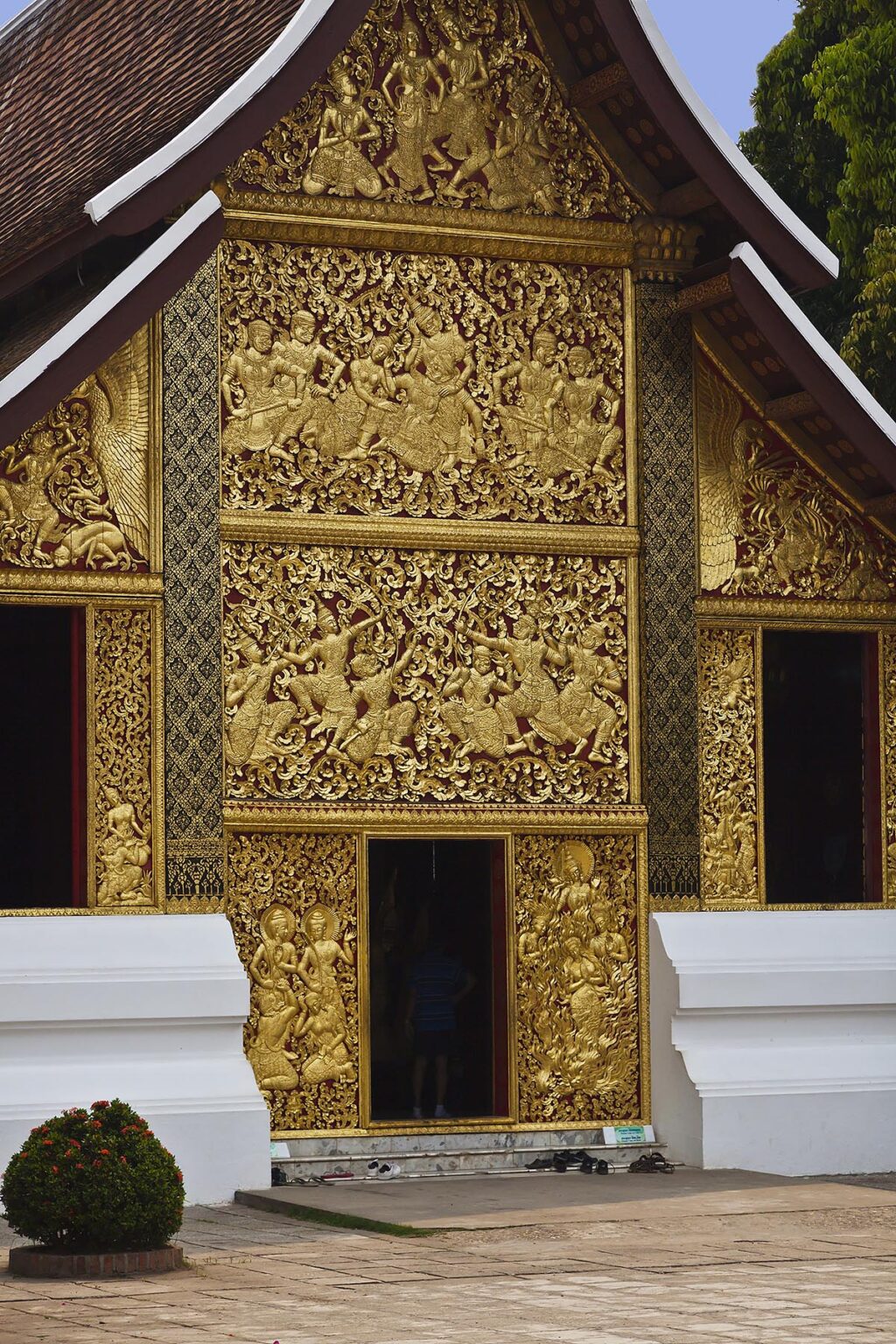 Gilded BAS RELIEF of Lao history at WAT XIENG THONG (Temple of the Golden City), built in 1560 - LUANG PRABANG, LAOS