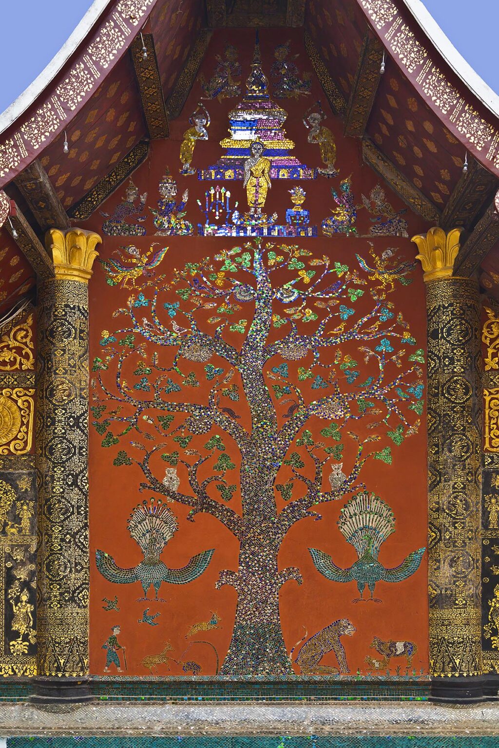 GLASS MOSAIC of the TREE OF LIFE decorates WAT XIENG THONG (Temple of the Golden City) , built in 1560 - LUANG PRABANG, LAOS